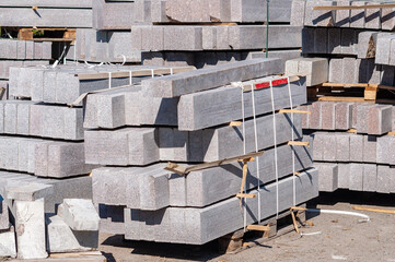 Many curbs for construction works on pallets