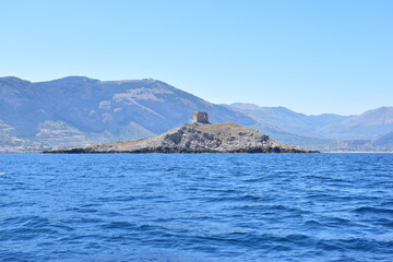 Fototapeta na wymiar Isolotto con la sua torre,Isola delle femmine, Palermo. Sicilia