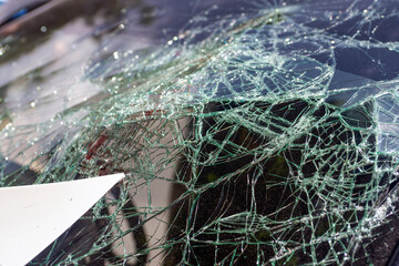 Broken car window in an accident.