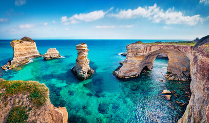 Spectacular summer view of popular tourist attraction - Torre Sant'Andrea. Beautiful morning seascape of Adriatic sea, Torre Sant'Andrea village location, Apulia region, Italy, Europe.