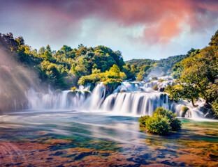 Fabulous summer view of powerful Skradinski Buk waterfall. Impressive morning scene of Krka National Park, Lozovac village location, Croatia, Europe. Beautiful world of Mediterranean countries.