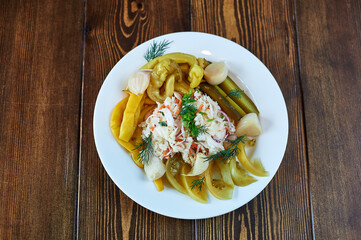 A plate of food sitting on top of a wooden table