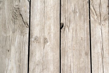 The texture of the old floorboard.