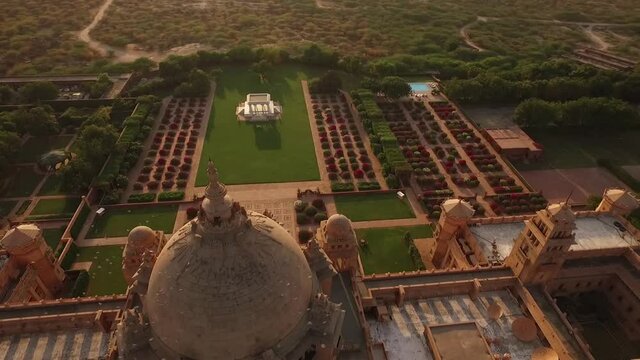 An aerial view shows birds flying over the Umaid Bhawan Palace in Jodhpur, India.