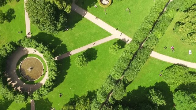 A bird's-eye-view shows people enjoying a public park in Copenhagen, Denmark.