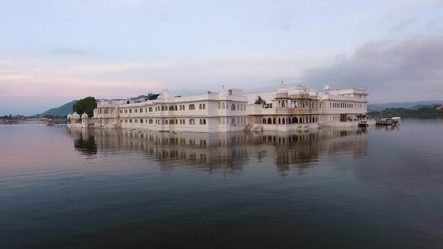 The Taj Lake Palace on Lake Pichola in Udaipur, India is seen at sunset.