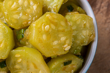 .Cooked gherkin dish. On a wooden table. Typical Brazilian dish