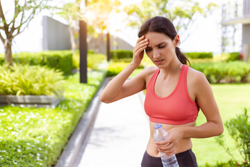 Sport woman thirsty dehydrated in hot weather Dehydration, overheating, thirst, heat stroke, health...
