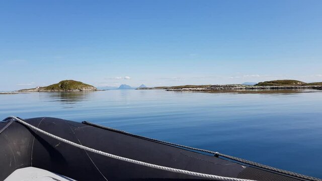 calm silent sea and small islands outside the island of Heroy, Nordland