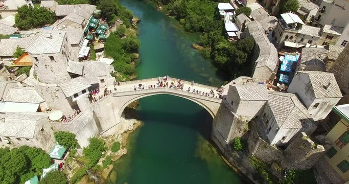 A bird's-eye-view shows the Mostar Bridge and the Neretva River it passes over in Mostar, Bosnia.