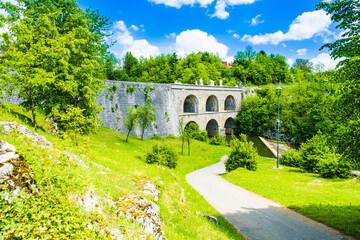 Croatia, beautiful 19 century stone bridge with arches in Tounj on Tounjcica river
