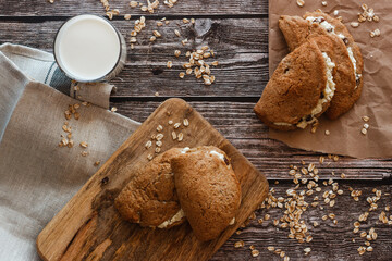 Tasty cakes with cottage cheese and raisins. Patties on a wooden table. Country style