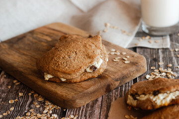 Tasty cakes with cottage cheese and raisins. Patties on a wooden table. Country style