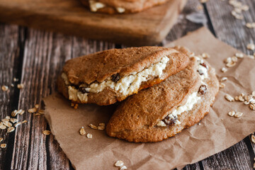 Tasty cakes with cottage cheese and raisins. Patties on a wooden table. Country style