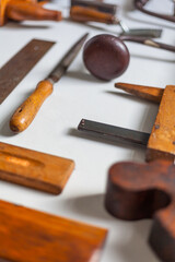 Hand drill and other traditional carpentry tools in perspective copy space drill lyre wooden file...