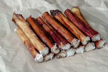 Stack of bully pizzle for dogs close-up