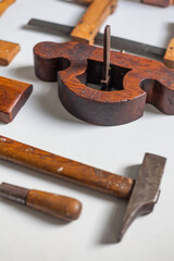 Compilation of traditional carpenter's tool for woodworking  Gouging machine and chamber of handicrafts with other traditional wooden tools copy space bored wood rasp retro vintage noble patina