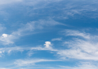 Naklejka na ściany i meble Beautiful blue sky background with clouds