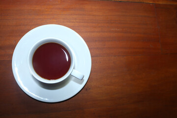 coffee or tea cup on wood table background