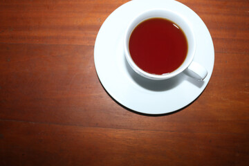 cup of tea on wood background