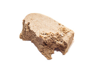 Broken halva piece on white background