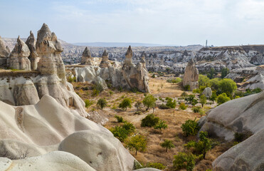 Unique fancy geological mountain formations with dovecotes of the Pigeon valley in Goreme, Cappadocia, Turkey © Dmytro