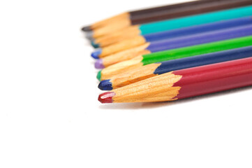  Colored pencils on a white background close up