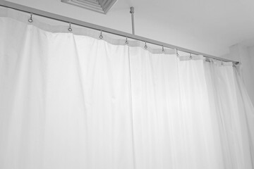 white​ curtain​s​ in​ the​ waiting​ room​ at​ the​ hospital.