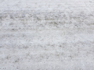 wet slippery ice on public road