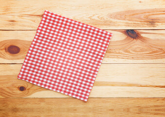 Empty wooden deck table with table cloth