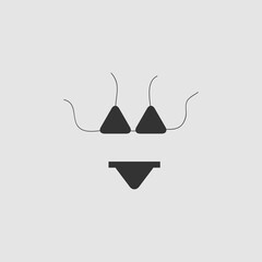 Swimsuit icon flat.