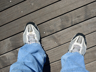 feet on boardwalk