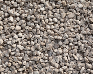 Texture of pale grey gravel. Abstract stones texture