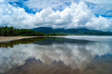 Coulds Refelcting on a Beach
