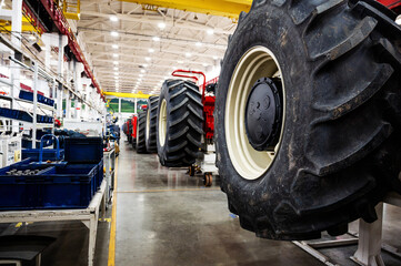 Fototapeta na wymiar large wheels for tractors and kamaz to a factory
