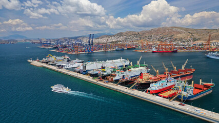 Aerial drone panoramic photo of industrial loading/unloading logistics container area of Perama,...