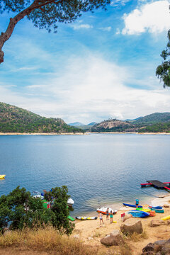 Landscape of the "San Juan" reservoir where multiple water sports are practiced and is also known as the Madrid beach