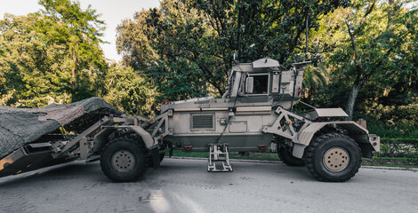 Fototapeta premium Vehicle Mounted Mine Detector. Husky VMMD 2G. Display of military vehicles. Spanish Armed Forces Day.