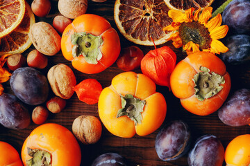 Naklejka na ściany i meble Autumn still-life composition with fresh fruits and vegetables