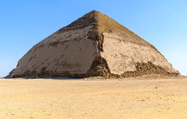 Fototapeta na wymiar Bent Pyramid at Dahshur Necropolis in an arid landscape near Cairo-Egypt