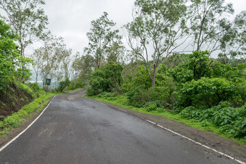 Plakat Monsoon trek at Sinhagad Fort, near Pune in India.