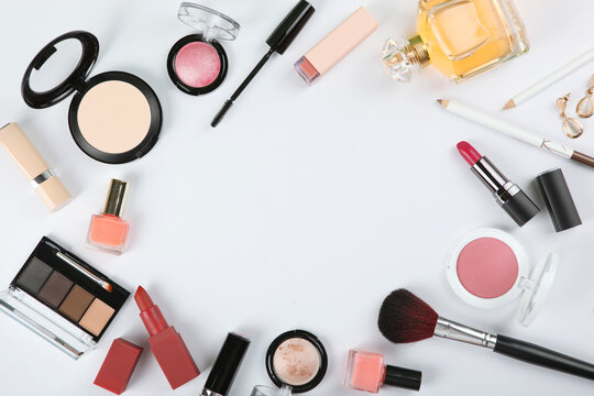 professional makeup tools. Makeup products on plain background top view. A set of various items for makeup.