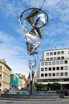 St. Olavs Plass was redesigned in recent years to make it more inviting for pedestrians.Centerpiece is fountain and light sculpture created by Swen Pahlsson in 2008. Oslo