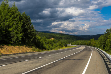 turning of asphalt road in the mountains