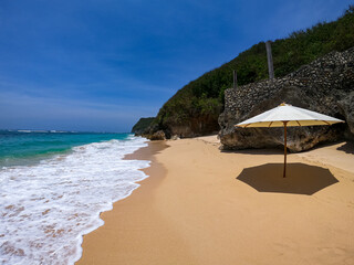 tropical beach with umbrella