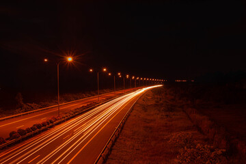 Fototapeta na wymiar traffic on the night road