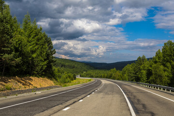 turning of asphalt road in the mountains