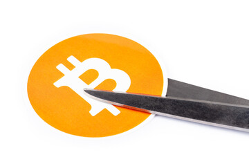 Bitcoin symbol, logo being cut in two with scissors, white background Halving, cutting price, going downwards, bearish crypto currency trend BTC in danger, value falling down threat abstract concept - obrazy, fototapety, plakaty