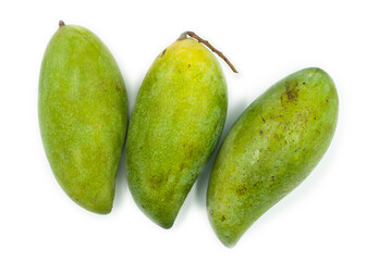 Green raw mango on a white background