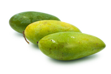 Green raw mango on a white background